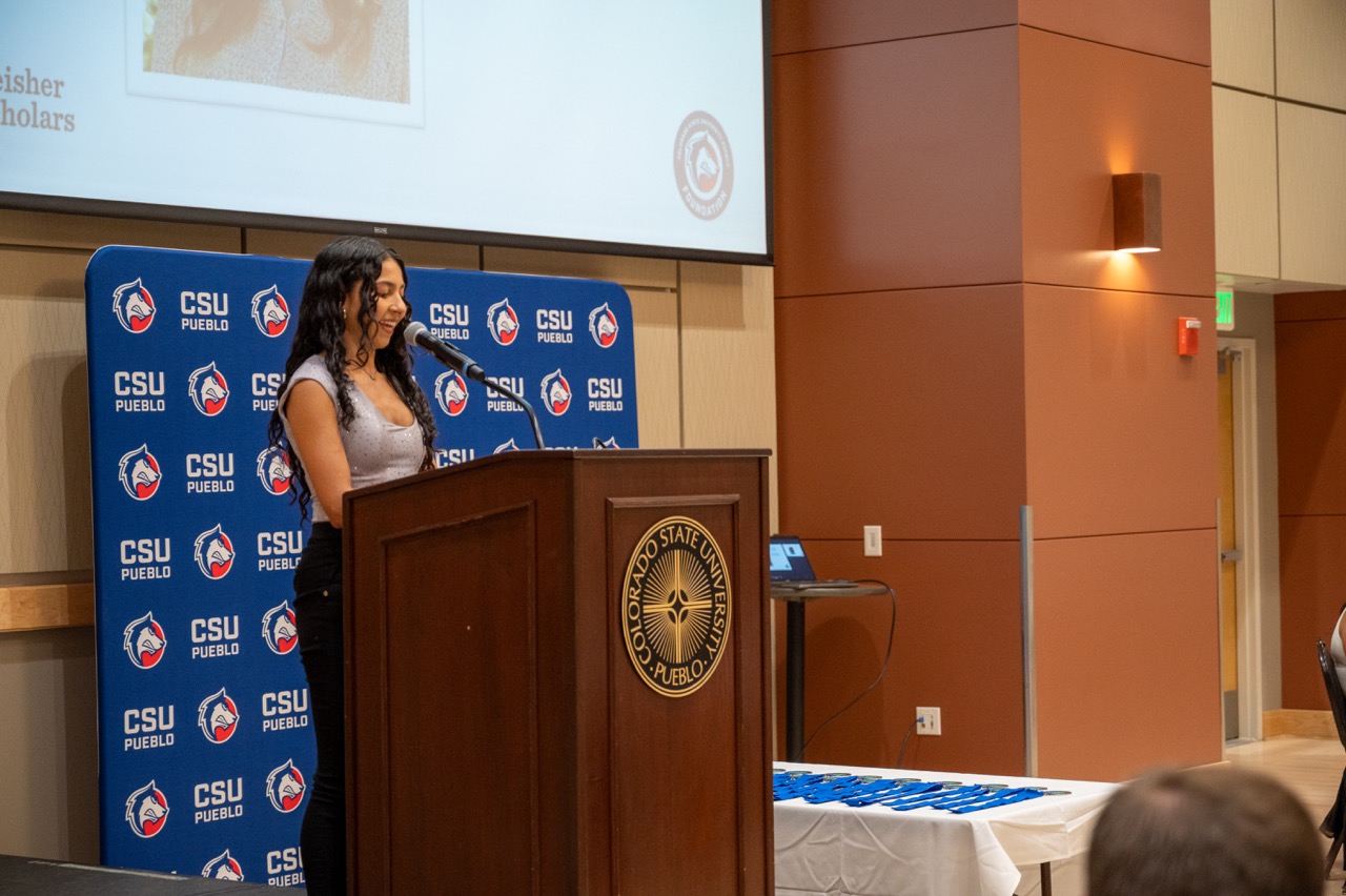 Cidonia Ponce speaks at the 2024 Reisher Scholars Event.